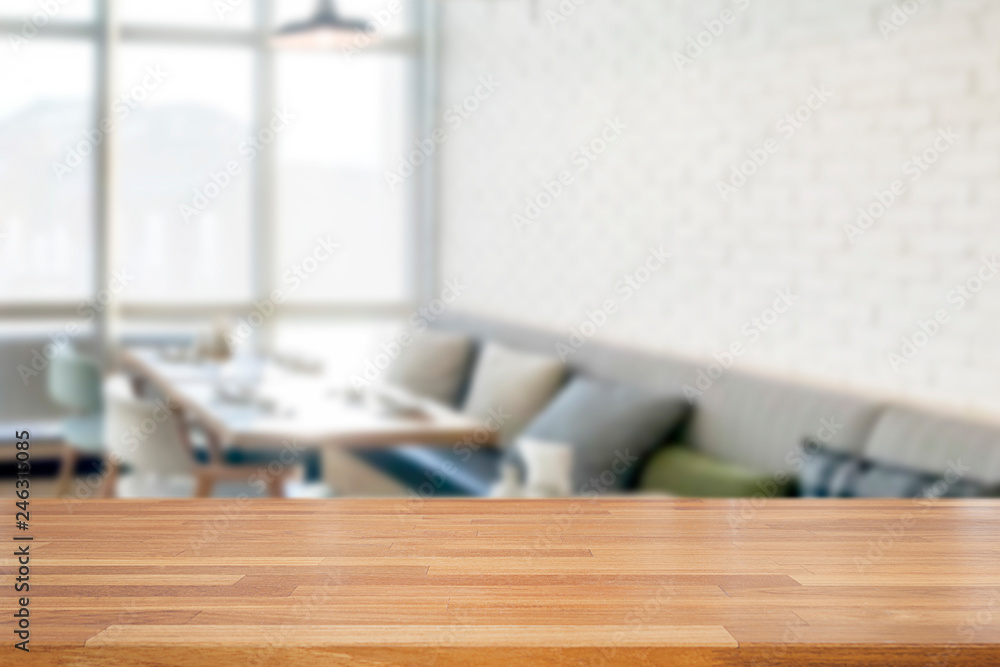 Empty wooden table and blurred modern white kitchen coffee cafe background, restaurants. Ready for product montage, bokeh , light Empty wooden table and blurred modern white kitchen coffee cafe background, restaurants. Ready for product montage, bokeh , light