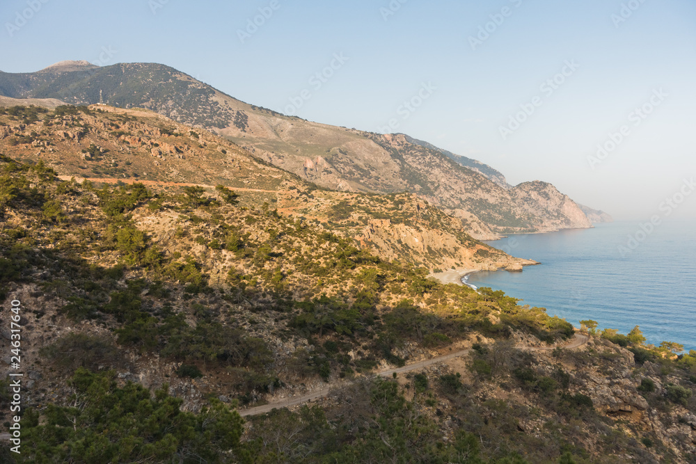 Viewpoint on a hiking trail near Lissos gorge to a coastline above Sougia bay at sunset, south-west coast of Crete island, Greece