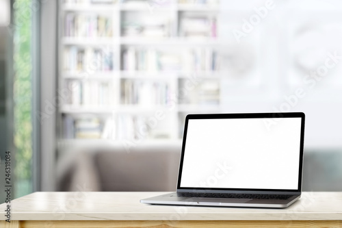 Mockup laptop on marble table top in living room background