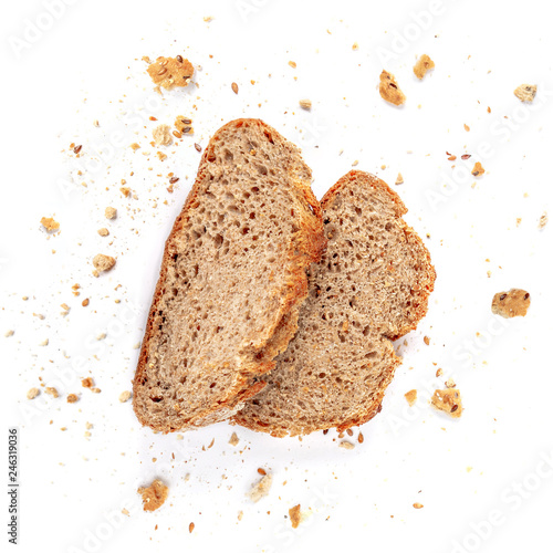 Bread toasts  isolated on  white background. Crumbs and Bread slices close up. Bakery, food concept. Top view