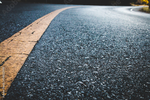Billede på lærred Close up black asphalt road texture background.