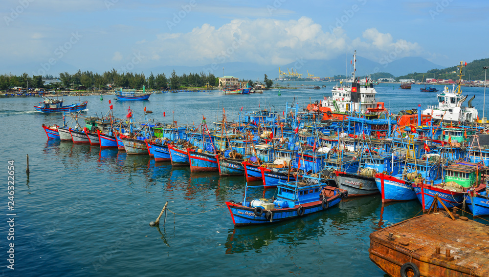 Wooden boats docking at Da Nang Pier