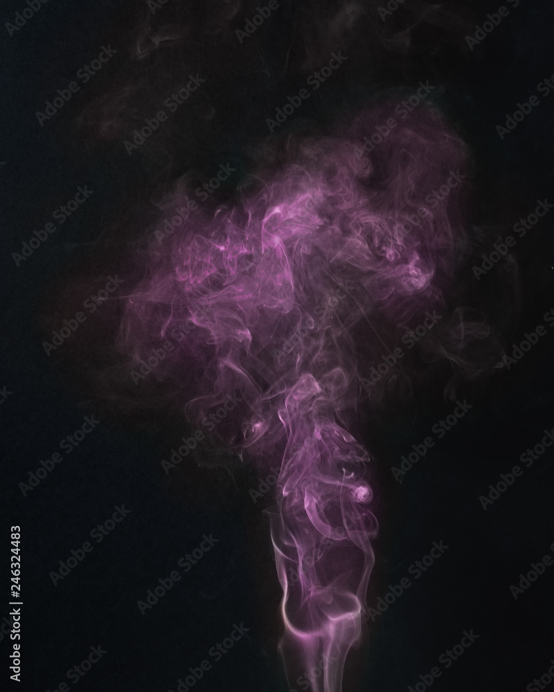 Fototapeta premium purple smoke on a black backround