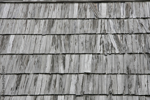 Background  fragment of the roof  made of wood  rectangular boards