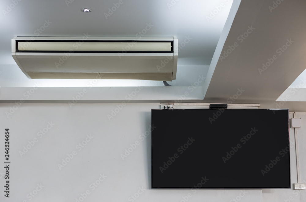 Air Conditioner with black display LED TV in guest room Air Conditioner with black display LED TV in guest room
