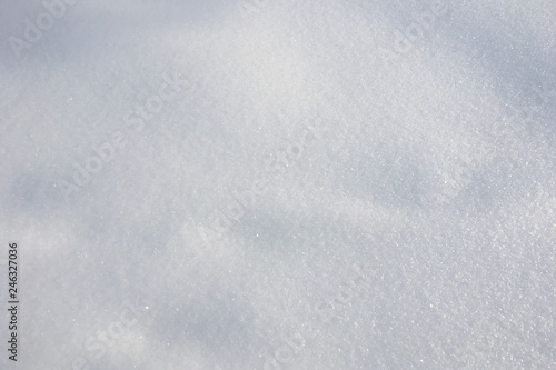 Background of pure white snow. Textured snow surface.