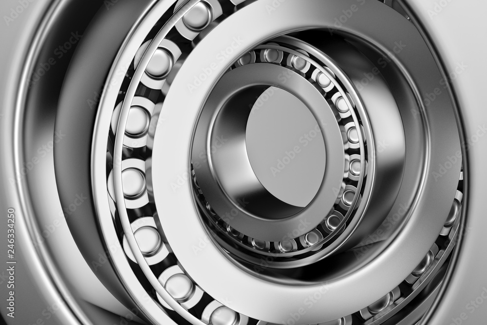 3D rendering. Automotive bearings auto spare parts. Tapered roller bearing isolated on a dark background. Wheel bearing for truck, heavy duty and car. 3D rendering. Automotive bearings auto spare parts. Tapered roller bearing isolated on a dark background. Wheel bearing for truck, heavy duty and car.