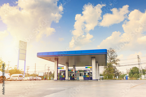 Obraz na płótnie Petrol gas fuel station with clouds and blue sky