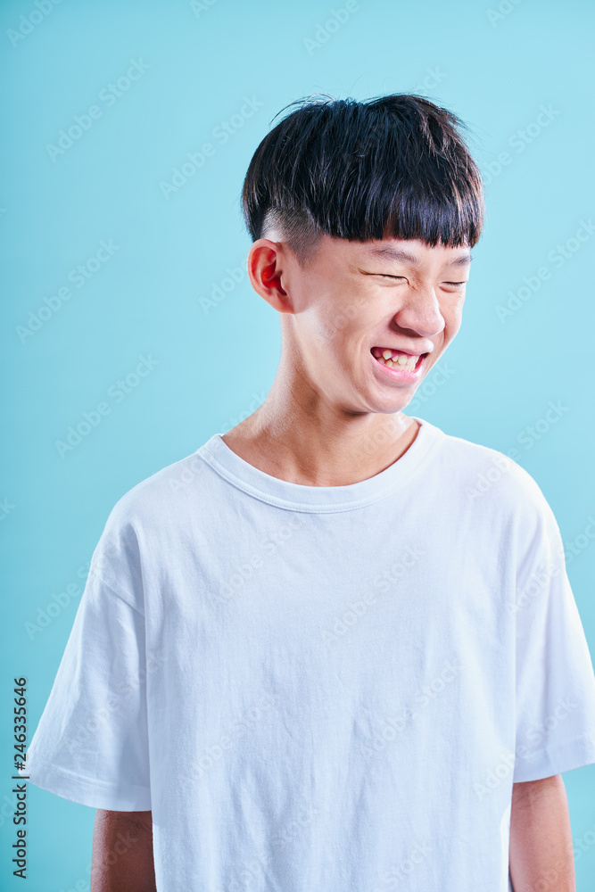 Portrait of Young asian teenage boy laugh . Stock Photo | Adobe Stock