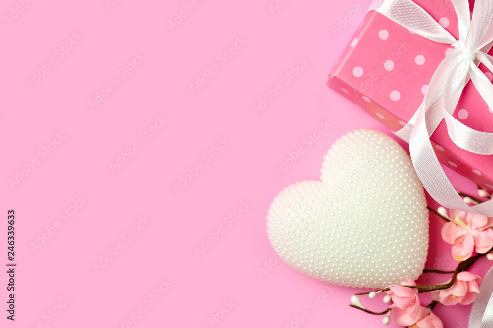Greeting card on pink background. Selective focus. Valentines day, Womens day, Mothers day. Background with copy space. Horizontal. Greeting card on pink background. Selective focus. Valentines day, Womens day, Mothers day. Background with copy space. Horizontal.