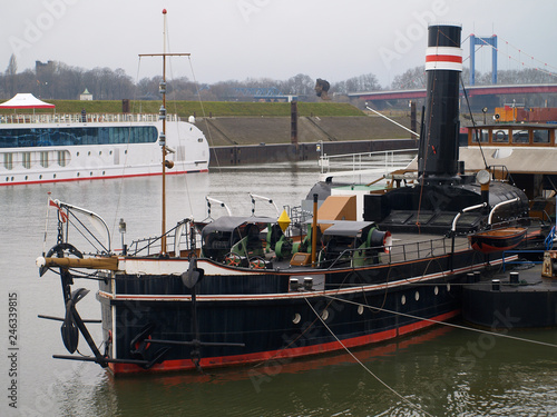 Картината върху платно vintage steam ship in the port of Duisburg
