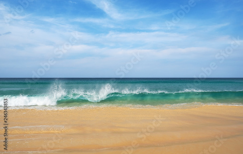 Ocean wave on a sandy beach in Thailand