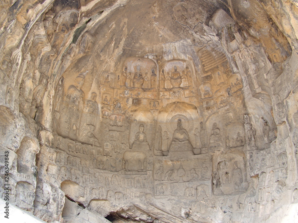 Luoyang Longmen grottoes. Broken Buddha and the stone caves and sculptures in the Longmen Grottoes in Luoyang, China. Taken in 14th October 2018