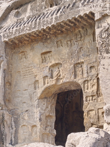 Wallpaper Mural Luoyang Longmen grottoes. Broken Buddha and the stone caves and sculptures in the Longmen Grottoes in Luoyang, China. Taken in 14th October 2018 Torontodigital.ca