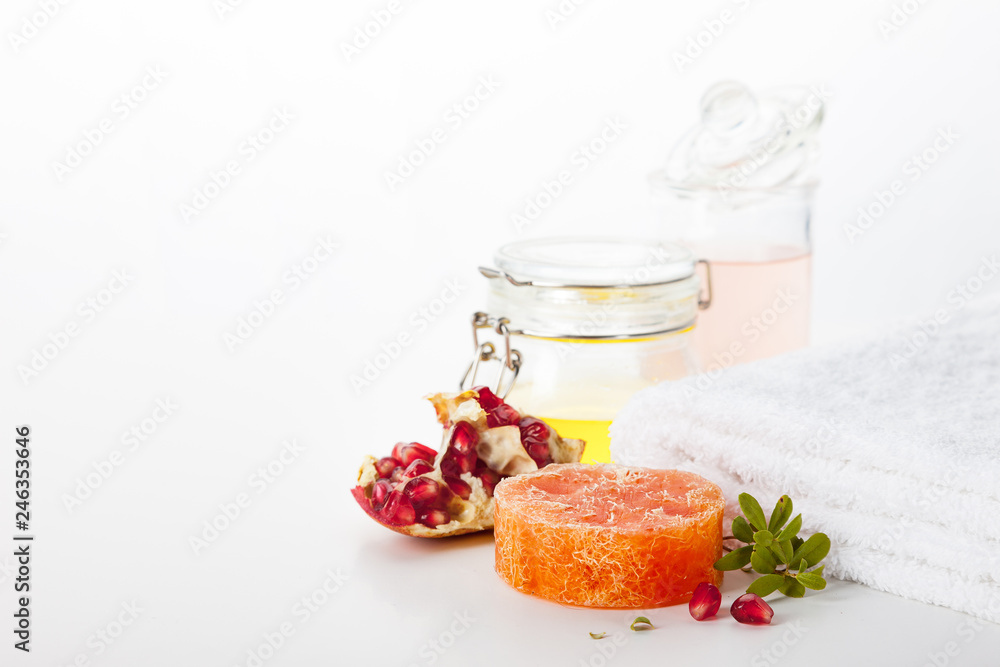 Natural handmade soap on a white background. Pomegranate-scented skin care. Spa treatments and aromatherapy for smooth and healthy skin. Natural handmade soap on a white background. Pomegranate-scented skin care. Spa treatments and aromatherapy for smooth and healthy skin.