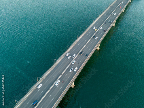 Vehicles on bridge over water
