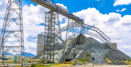 Platinum Mining and Processing of ore, Piles of ore rock being moved and stored