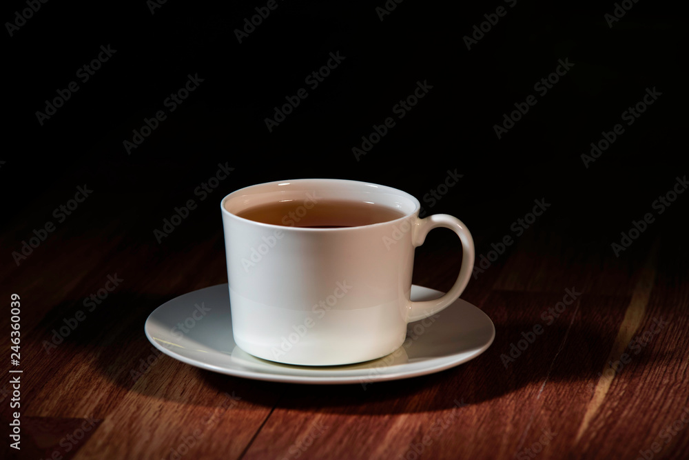 Obraz premium cup of tea on wooden table