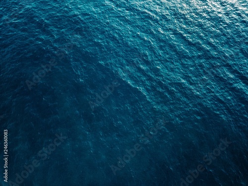 Aerial view of blue sea surface photo