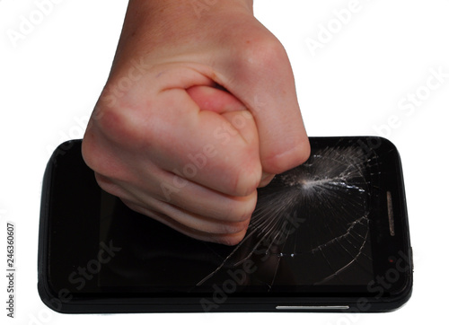 fist smashes smartphone. on white background
