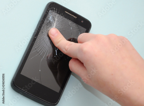 finger crushed smartphone screen