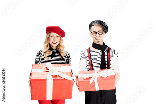 attractive woman holding gift box near french man isolated on white