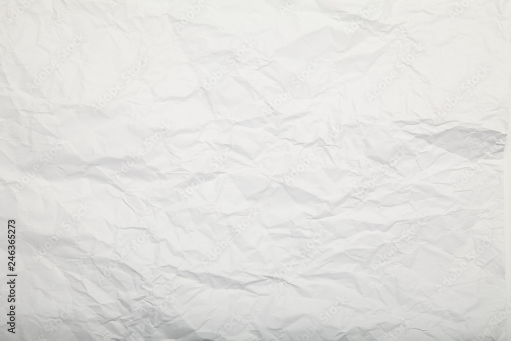 Obraz premium White crumpled paper texture.
