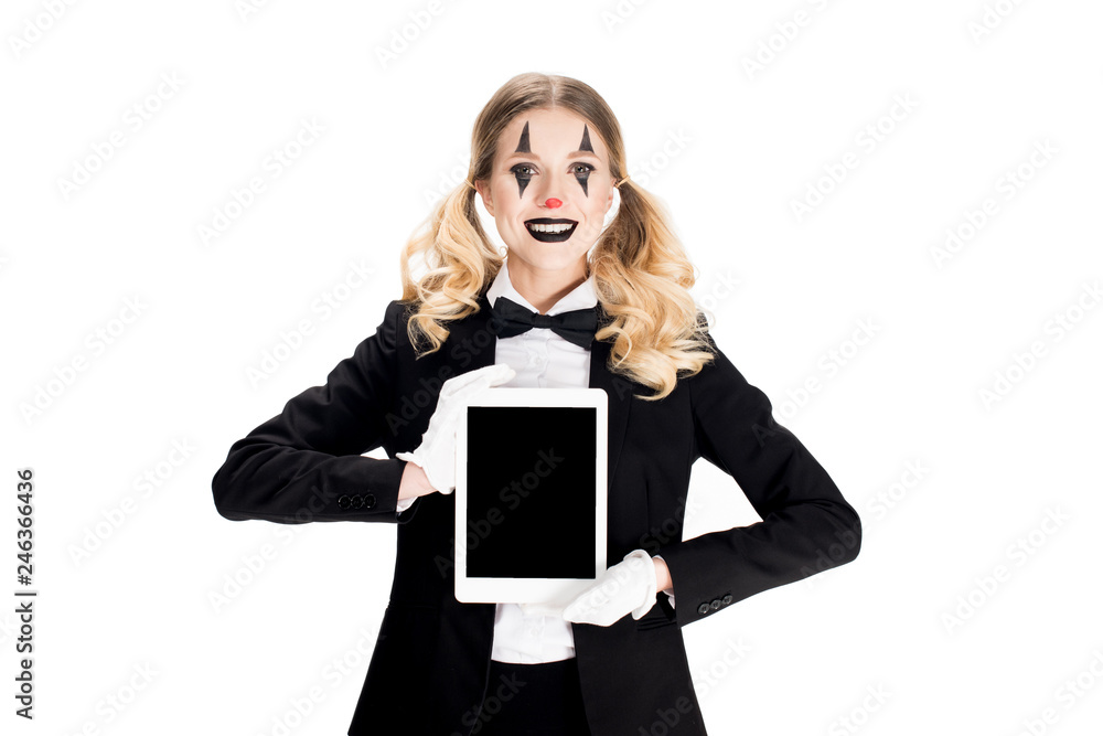 smiling blonde clown holding digital tablet with blank screen isolated on white smiling blonde clown holding digital tablet with blank screen isolated on white