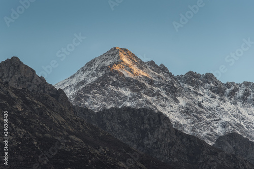 Snow capped peak of Monte San Parteo mountain in Corsica