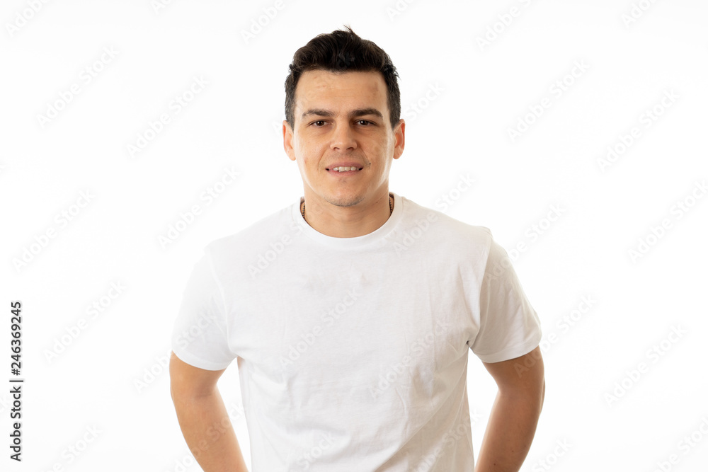 Human expressions and emotions. Young attractive man with a happy face, smiling and celebrating Human expressions and emotions. Young attractive man with a happy face, smiling and celebrating