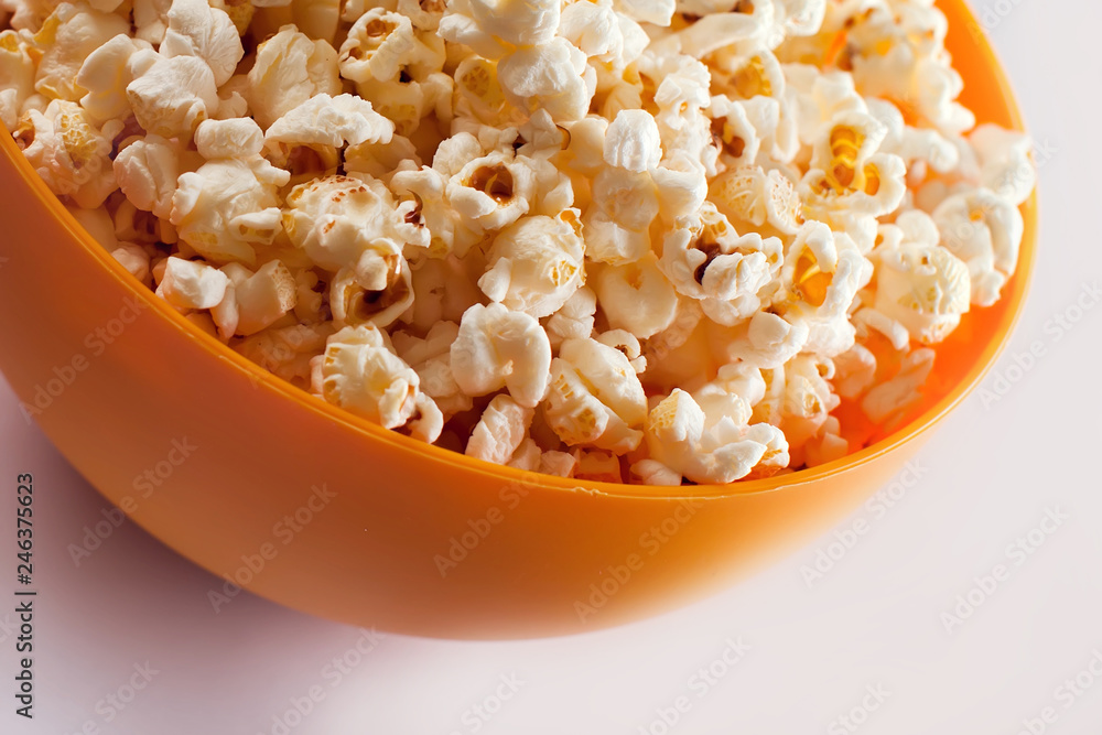 A bowl with popcorn isolated on white background. Food concept A bowl with popcorn isolated on white background. Food concept