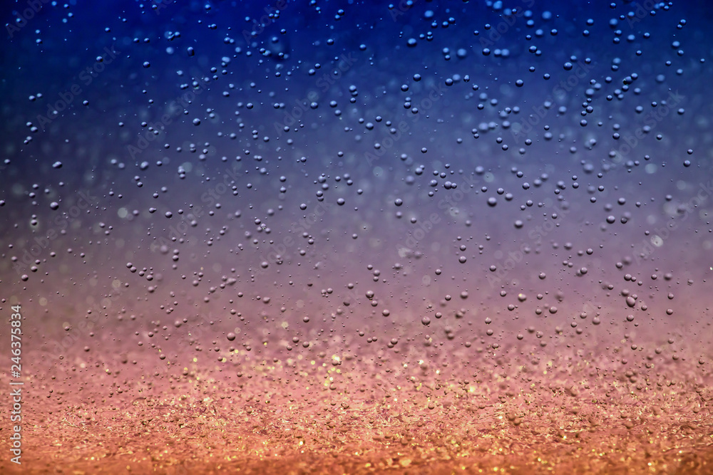 Splashes of raindrops on a colorful background