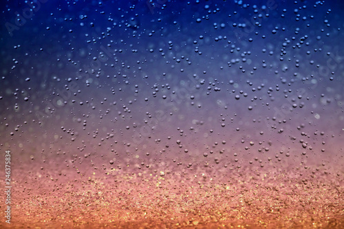 Splashes of raindrops on a colorful background