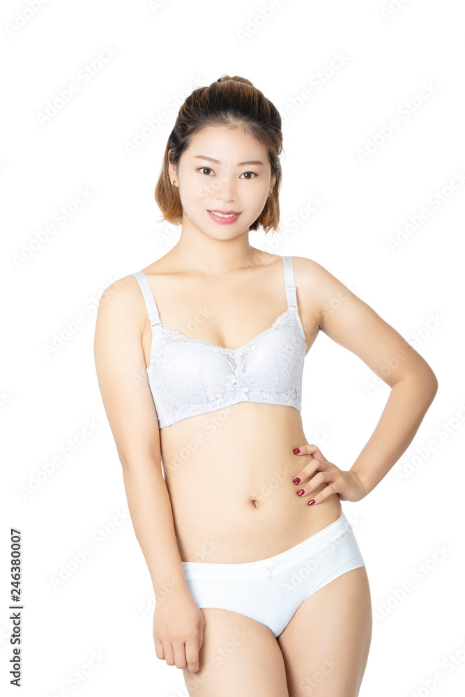Chinese woman posing in panties and bra on white background Chinese woman posing in panties and bra on white background