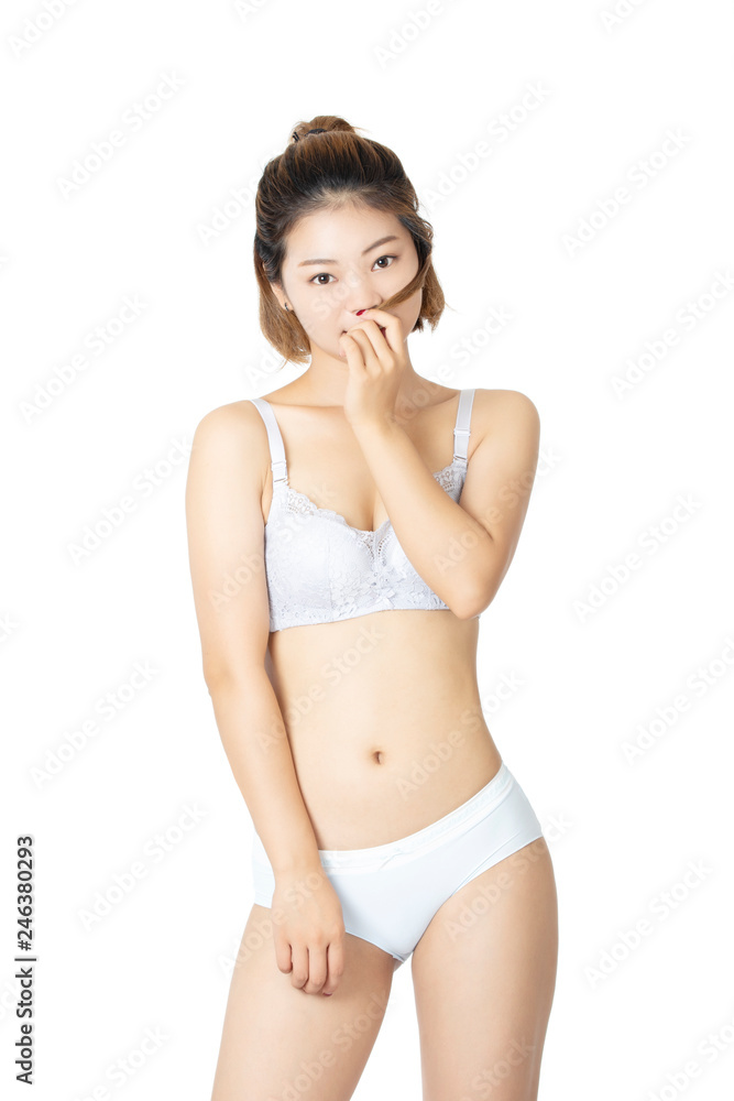 Chinese woman posing in panties and bra on white background Chinese woman posing in panties and bra on white background