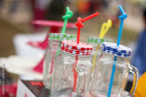 colorful drinking straws in a glass