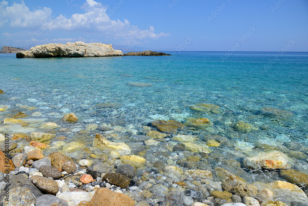 Entrance to the sea with a stone bottom, island, summer, island of Crete, Greece Entrance to the sea with a stone bottom, island, summer, island of Crete, Greece