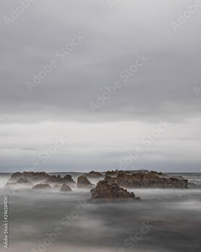 waves crashing on rocks