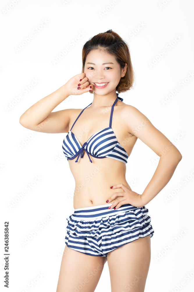 Naklejka premium Beautiful Chinese woman wearing a sexy bikini on white background