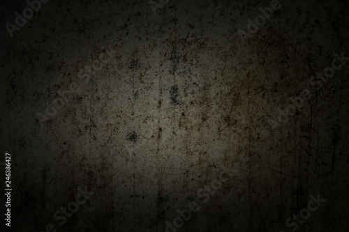 dark background and wallpaper or texture of paper wall or floor cement old and stain has dim light and copy space. © Panupong