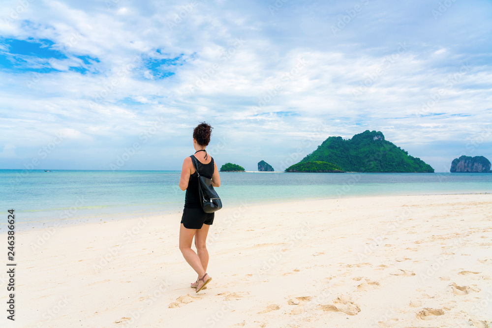 Woman on Beautiful Tropical Beach PP Island, Krabi, Phuket, Thailand blue ocean background girl items vacation accessories for holiday or long weekend a guide choice idea for planning travel Woman on Beautiful Tropical Beach PP Island, Krabi, Phuket, Thailand blue ocean background girl items vacation accessories for holiday or long weekend a guide choice idea for planning travel