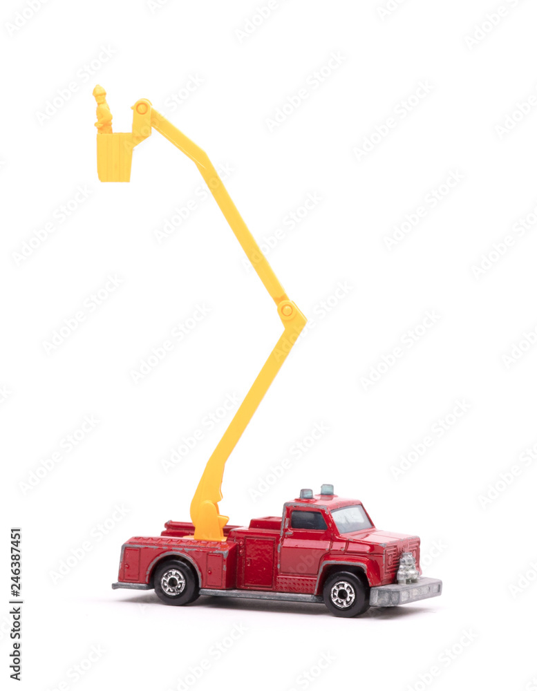 Fototapeta premium Toy firetruck with ladder