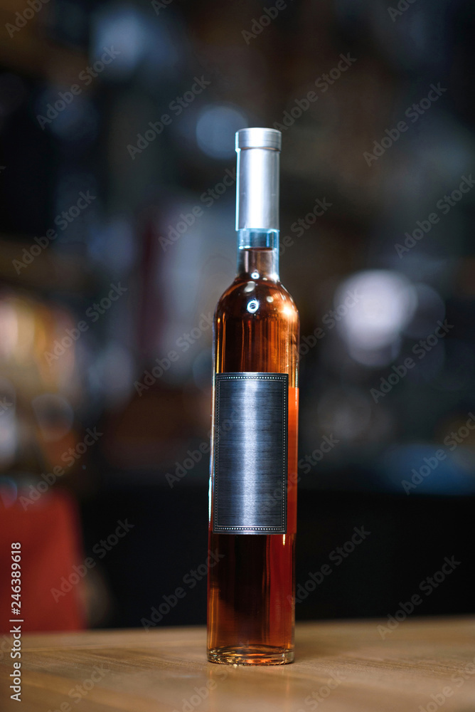 bottle of wine with silver label