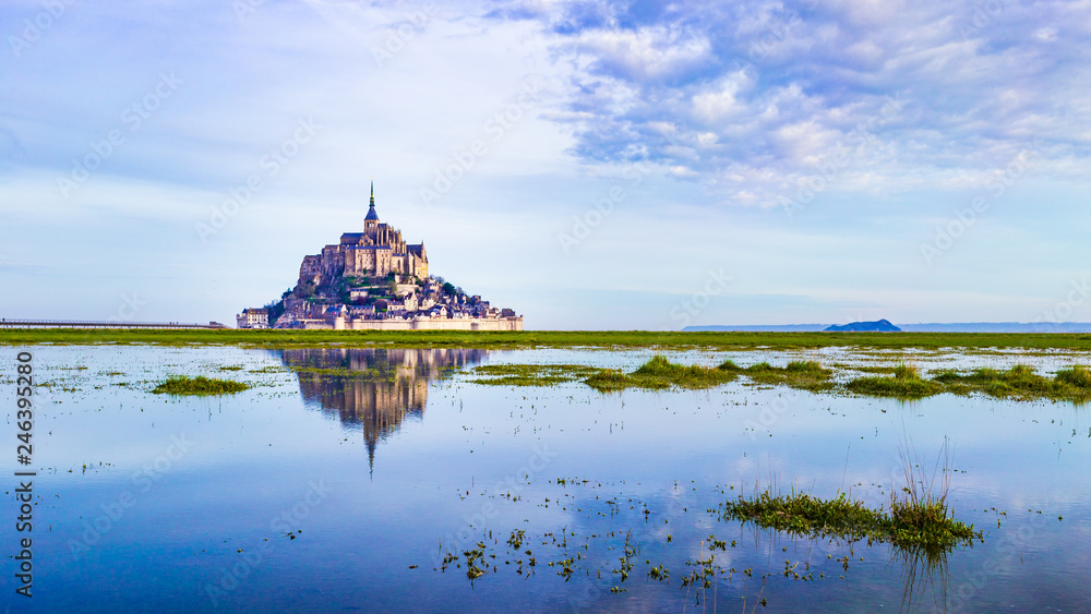 Fototapeta premium Mont-Saint-Michel reflecting in blue