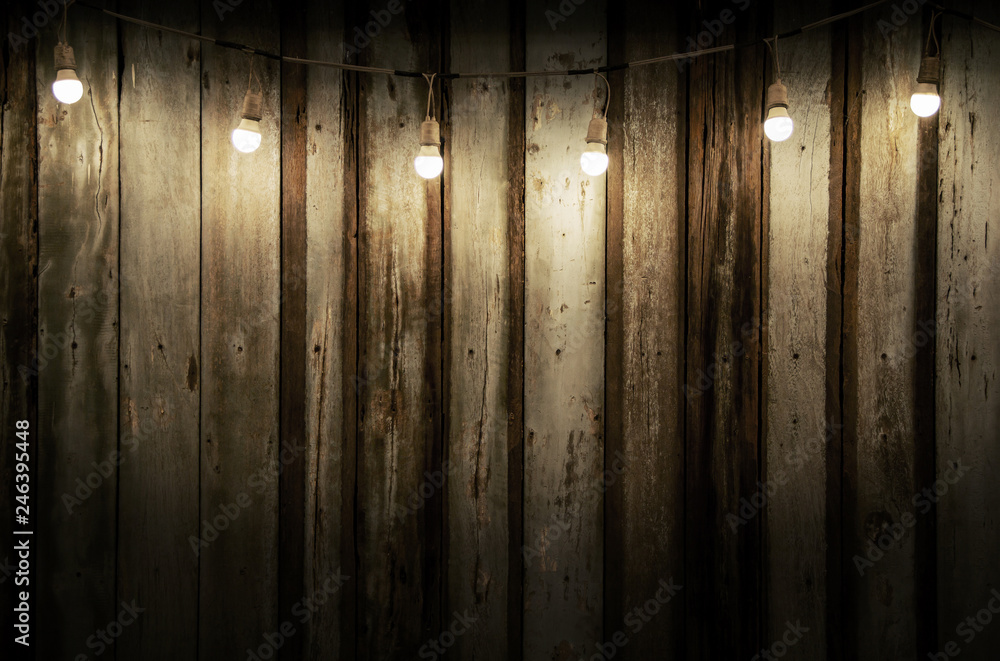 Low key image Old wood background with dim light from light decorated with  bulbs and copy space vintage style and retro. Stock Photo | Adobe Stock