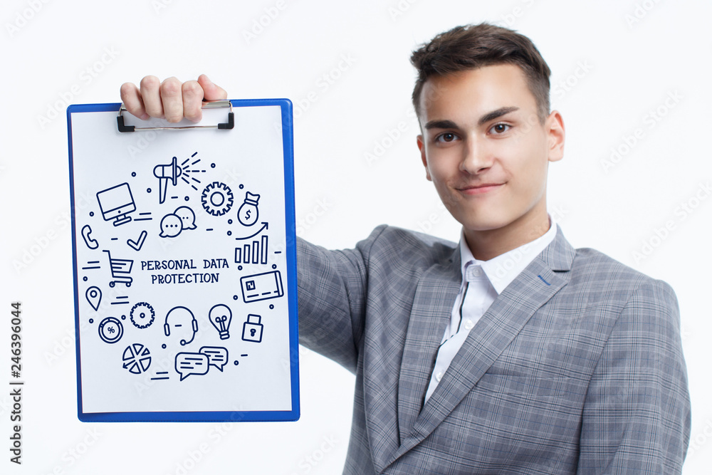 Business, technology, internet and networking concept. Young entrepreneur showing keyword: Personal data protection Business, technology, internet and networking concept. Young entrepreneur showing keyword: Personal data protection
