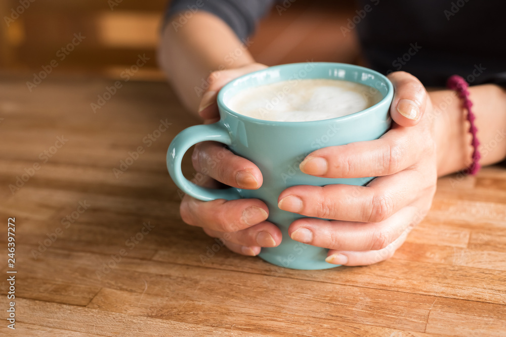 woman hold a cup a coffee woman hold a cup a coffee