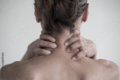 Rear View Of Tired Woman Holding Neck in Switzerland.