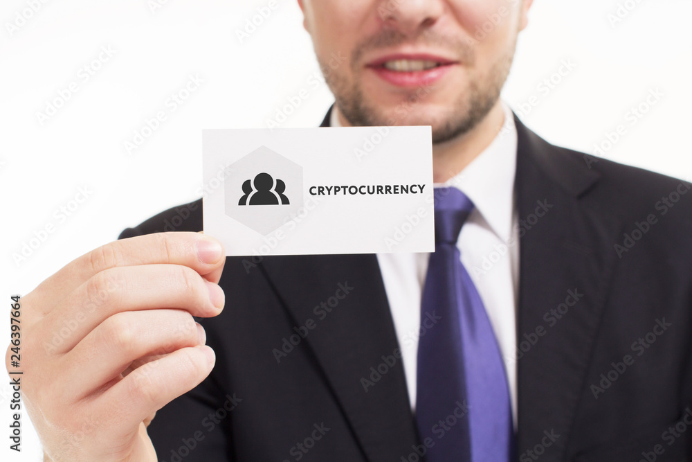 Business, technology, internet and networking concept. Young entrepreneur showing keyword: Cryptocurrency Business, technology, internet and networking concept. Young entrepreneur showing keyword: Cryptocurrency