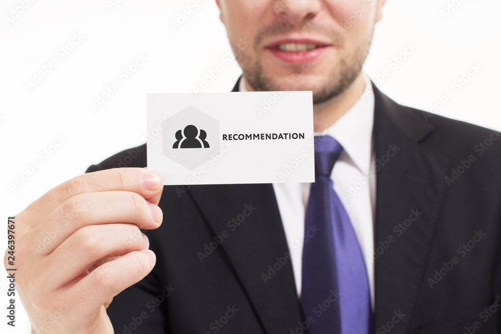 Business, technology, internet and networking concept. Young entrepreneur showing keyword: Recommendation Business, technology, internet and networking concept. Young entrepreneur showing keyword: Recommendation